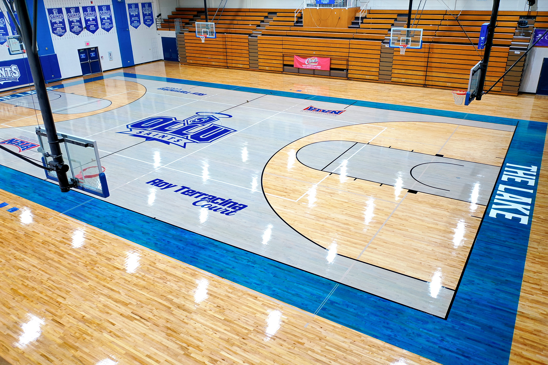 Our Lady of the Lake Univ. court sanding. Blue Stain SATX